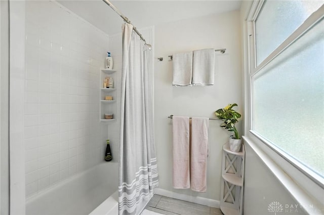 1424 Hillary Ln, Mason, OH 45040 - full bathroom featuring shower / bath combo with shower curtain and baseboards