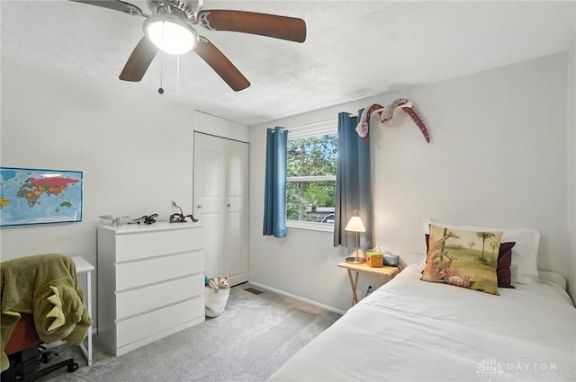 1424 Hillary Ln, Mason, OH 45040 - carpeted bedroom with a ceiling fan and a textured ceiling