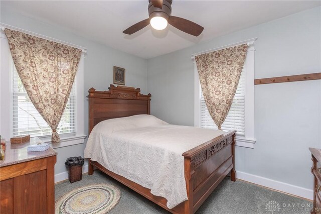 2817 Whittier Ave, Dayton, OH 45420 - carpeted bedroom with baseboards and ceiling fan