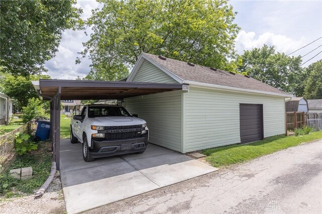 2817 Whittier Ave, Dayton, OH 45420 - view of vehicle parking featuring a carport and driveway