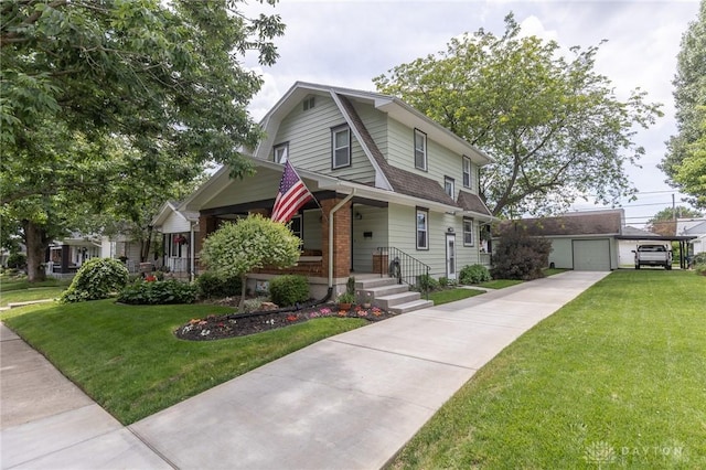 2817 Whittier Ave, Dayton, OH 45420 - colonial inspired home with a gambrel roof, a porch, a front yard, a shingled roof, and brick siding