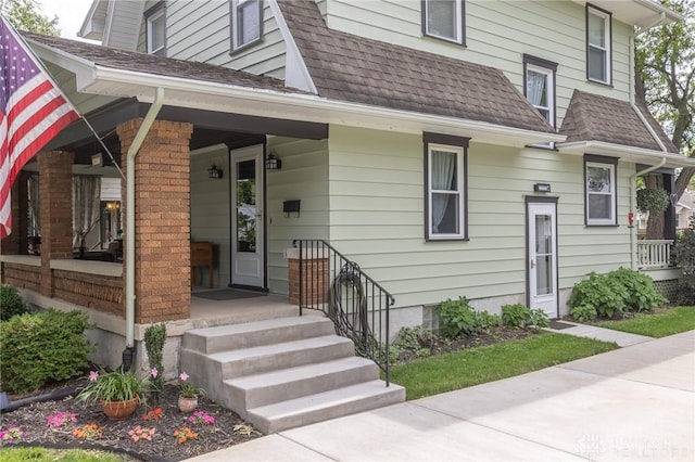 2817 Whittier Ave, Dayton, OH 45420 - entrance to property featuring a porch and a shingled roof