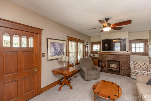 2817 Whittier Ave, Dayton, OH 45420 - living area with a fireplace and a ceiling fan