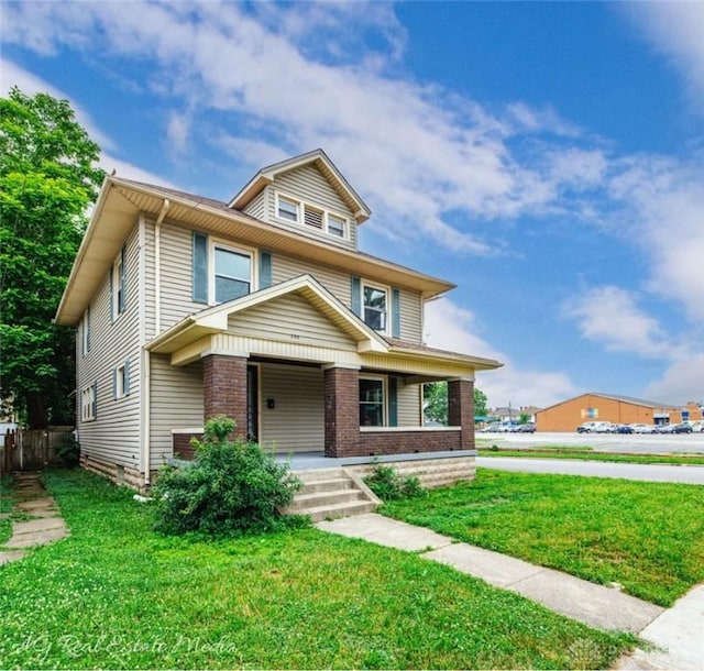 200 Garfield St, Middletown, OH 45044 - traditional style home featuring covered porch and brick siding
