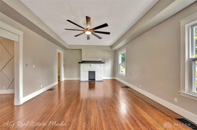 200 Garfield St, Middletown, OH 45044 - unfurnished living room with plenty of natural light, a ceiling fan, and wood finished floors