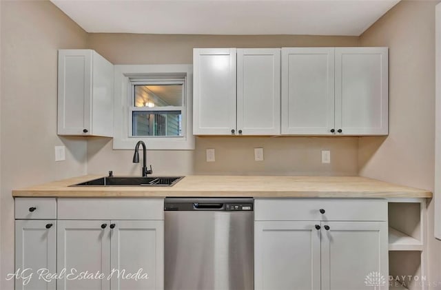 200 Garfield St, Middletown, OH 45044 - kitchen featuring dishwasher, white cabinets, and light countertops