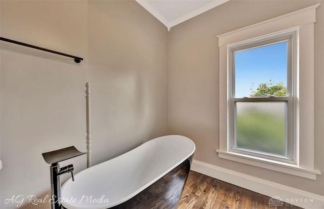 200 Garfield St, Middletown, OH 45044 - bathroom featuring a freestanding bath, wood finished floors, and ornamental molding
