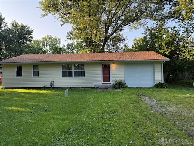 4904 Alpha Rd, Springfield, OH 45504 - ranch-style house with a front yard and driveway