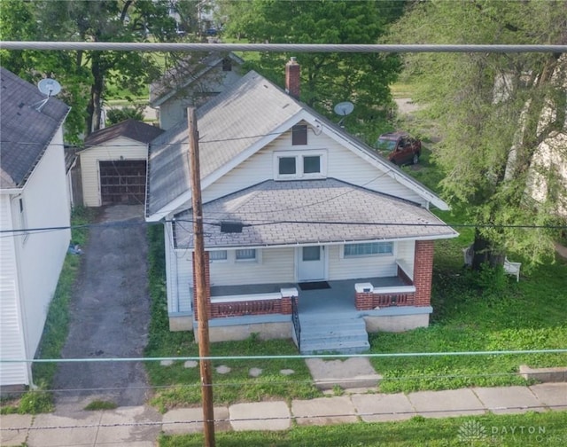 2107 Woodlawn Ave, Middletown, OH 45044 - bungalow-style home with covered porch and a shingled roof