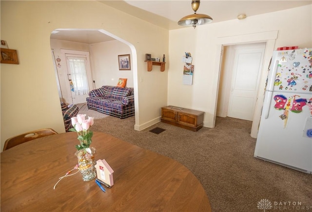 2107 Woodlawn Ave, Middletown, OH 45044 - dining space featuring arched walkways and carpet floors
