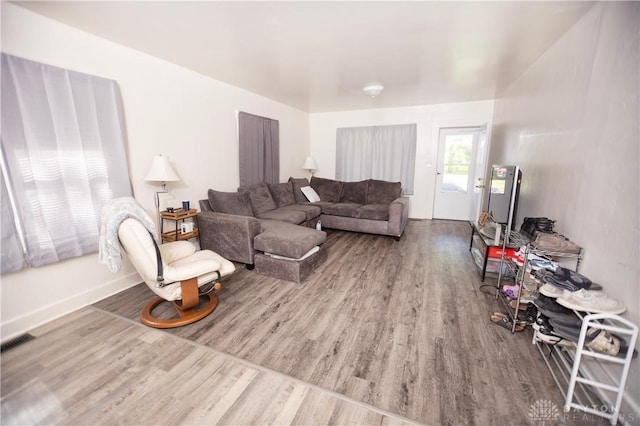 2107 Woodlawn Ave, Middletown, OH 45044 - living room featuring wood finished floors and baseboards