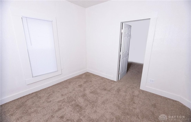 2107 Woodlawn Ave, Middletown, OH 45044 - spare room with carpet and baseboards