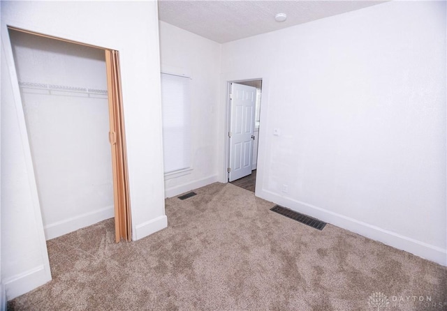 2107 Woodlawn Ave, Middletown, OH 45044 - unfurnished bedroom featuring carpet floors and a closet