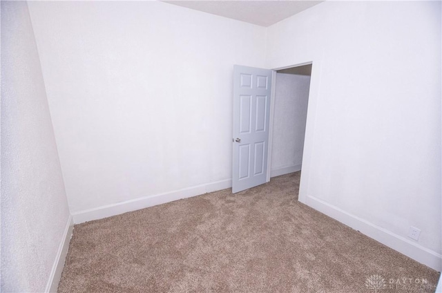 2107 Woodlawn Ave, Middletown, OH 45044 - spare room with light colored carpet