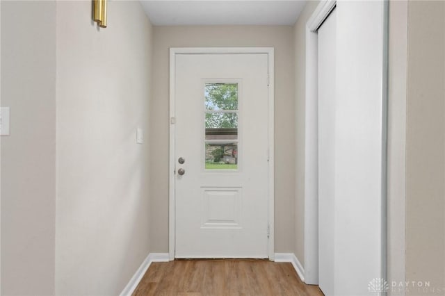 40 Rosewood Dr, Springboro, OH 45066 - doorway featuring light wood-style floors and baseboards