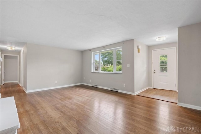 40 Rosewood Dr, Springboro, OH 45066 - entrance foyer featuring plenty of natural light and wood finished floors