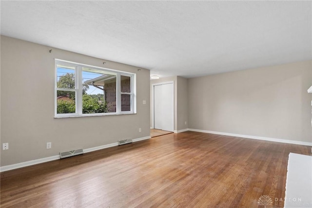 40 Rosewood Dr, Springboro, OH 45066 - unfurnished room with wood finished floors and baseboards