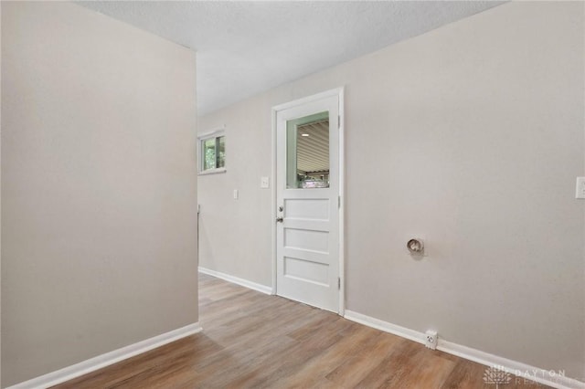 40 Rosewood Dr, Springboro, OH 45066 - spare room featuring baseboards and light wood finished floors