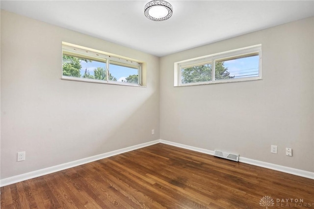 40 Rosewood Dr, Springboro, OH 45066 - unfurnished room featuring baseboards and wood finished floors