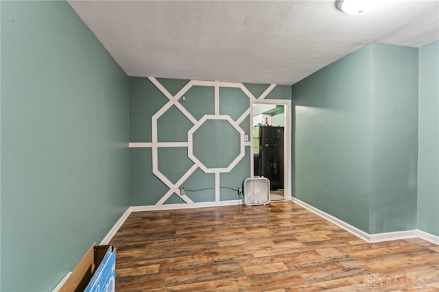 3558 Stanford Pl, Dayton, OH 45406 - unfurnished room featuring wood finished floors and baseboards