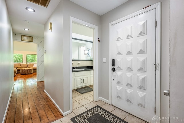 1839 Quail Hollow Rd, Washington Twp, OH 45459 - hall with recessed lighting and light tile patterned floors