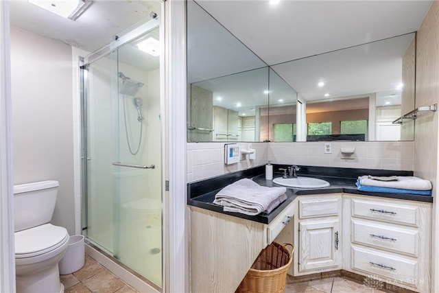 1839 Quail Hollow Rd, Washington Twp, OH 45459 - full bathroom with a shower stall, vanity, backsplash, and tile patterned flooring