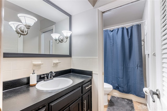 1839 Quail Hollow Rd, Washington Twp, OH 45459 - bathroom with vanity, a chandelier, tile patterned floors, shower / bath combo, and tile walls