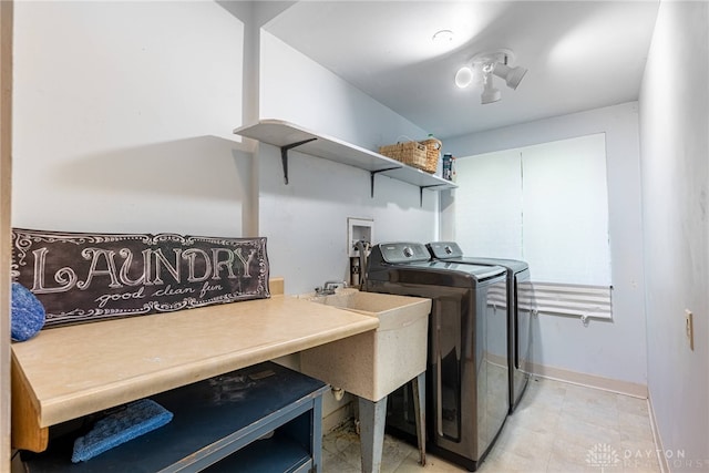 1839 Quail Hollow Rd, Washington Twp, OH 45459 - washroom with separate washer and dryer and baseboards
