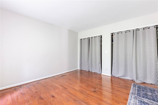 1839 Quail Hollow Rd, Washington Twp, OH 45459 - unfurnished bedroom featuring hardwood / wood-style flooring and baseboards
