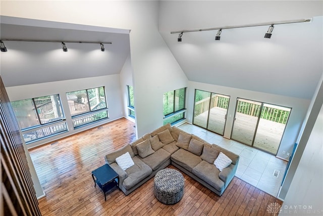 1839 Quail Hollow Rd, Washington Twp, OH 45459 - living area featuring track lighting, hardwood / wood-style flooring, and high vaulted ceiling