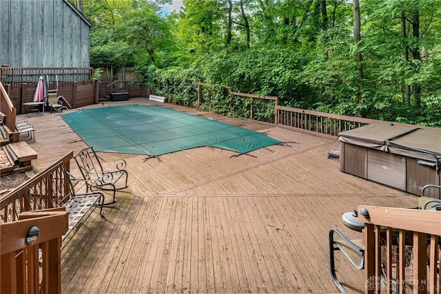 1839 Quail Hollow Rd, Washington Twp, OH 45459 - view of pool with a wooden deck, a fenced backyard, a hot tub, and view of wooded area