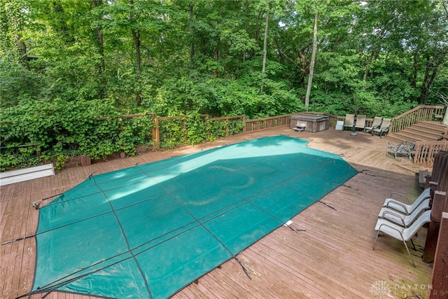 1839 Quail Hollow Rd, Washington Twp, OH 45459 - view of pool with a deck, a hot tub, and a forest view