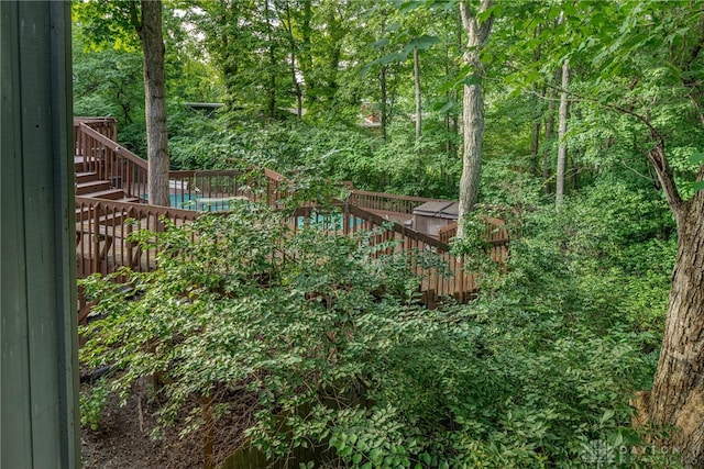1839 Quail Hollow Rd, Washington Twp, OH 45459 - view of yard with stairs, a deck, and a wooded view