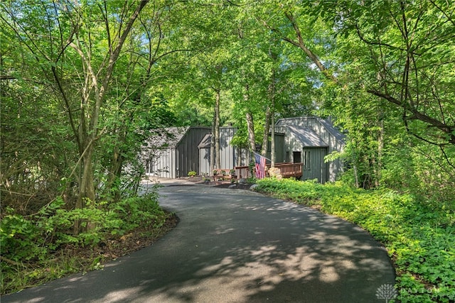 1839 Quail Hollow Rd, Washington Twp, OH 45459 - view of front of home with asphalt driveway and an outbuilding