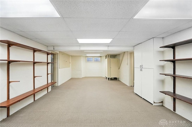 1160 Lytle Ln, Kettering, OH 45409 - below grade area with light colored carpet and a drop ceiling