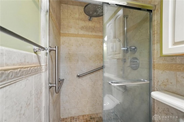 1160 Lytle Ln, Kettering, OH 45409 - full bath with a shower stall and tile walls