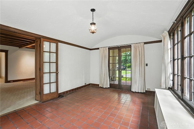 1160 Lytle Ln, Kettering, OH 45409 - empty room featuring vaulted ceiling, dark tile patterned flooring, and french doors