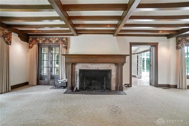 1160 Lytle Ln, Kettering, OH 45409 - unfurnished living room with carpet floors, beamed ceiling, a tile fireplace, and coffered ceiling