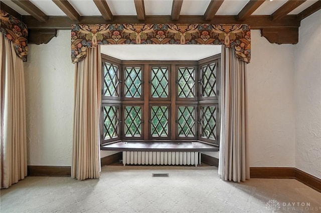 1160 Lytle Ln, Kettering, OH 45409 - interior space with beamed ceiling, a textured wall, and tile patterned floors