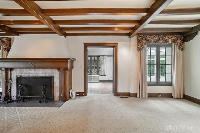 1160 Lytle Ln, Kettering, OH 45409 - unfurnished living room with beam ceiling, coffered ceiling, a fireplace with flush hearth, and tile patterned floors