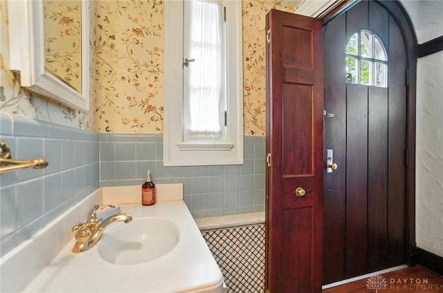 1160 Lytle Ln, Kettering, OH 45409 - bathroom with wallpapered walls, wainscoting, and tile walls