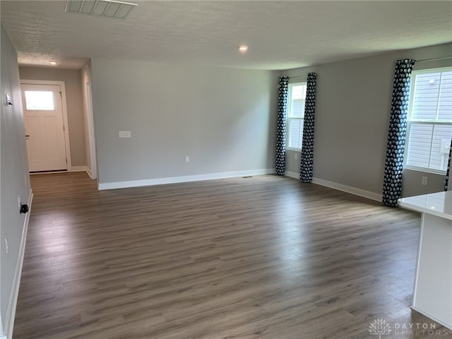 6655 Roycroft Dr, Middletown, OH 45042 - empty room with healthy amount of natural light and wood finished floors