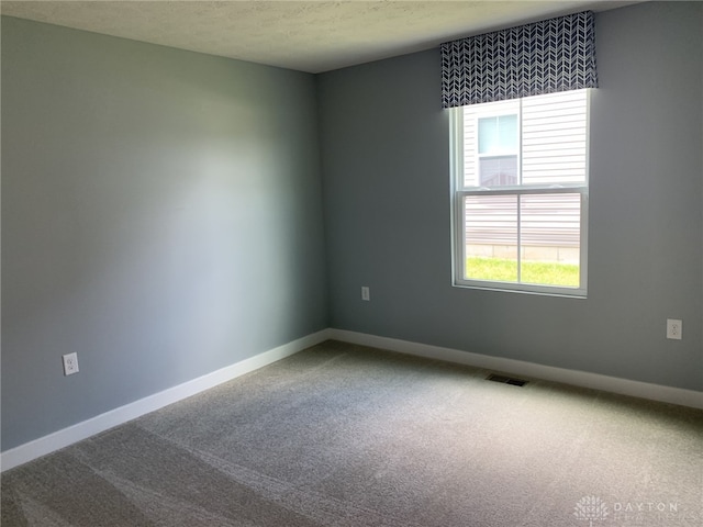 6655 Roycroft Dr, Middletown, OH 45042 - unfurnished room featuring carpet and a textured ceiling
