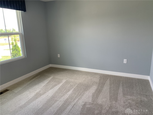 6655 Roycroft Dr, Middletown, OH 45042 - carpeted empty room with baseboards