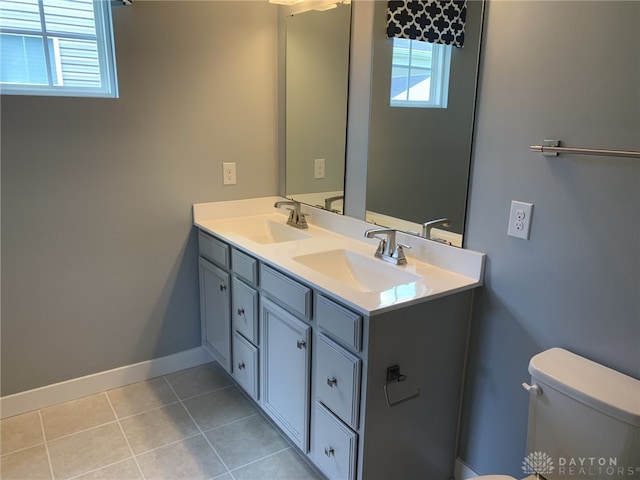 6655 Roycroft Dr, Middletown, OH 45042 - bathroom with double vanity and tile patterned floors