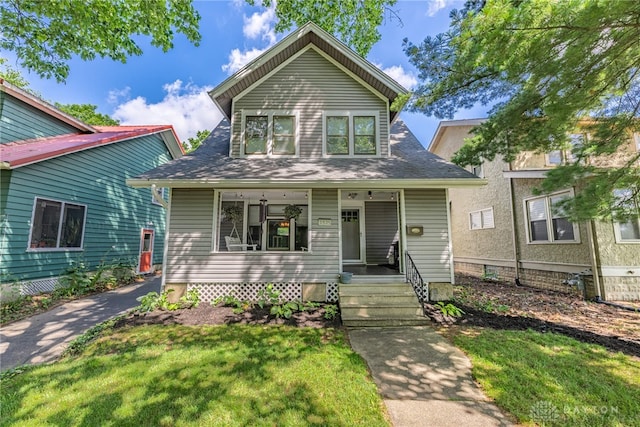 1525 Crescent Blvd, Kettering, OH 45409 - bungalow-style house with a front yard and a porch