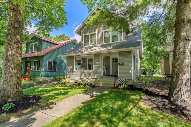 1525 Crescent Blvd, Kettering, OH 45409 - view of front facade featuring a porch and a front yard