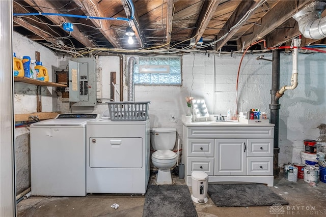 1525 Crescent Blvd, Kettering, OH 45409 - laundry room featuring electric panel and washer and dryer