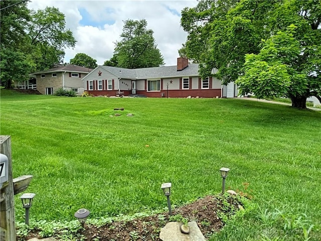 5757 S Dixie Hwy, Franklin, OH 45005 - view of front of house with a chimney and a front yard