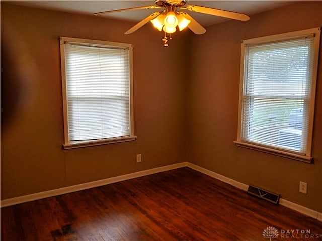 5757 S Dixie Hwy, Franklin, OH 45005 - spare room with dark wood-style floors and a ceiling fan